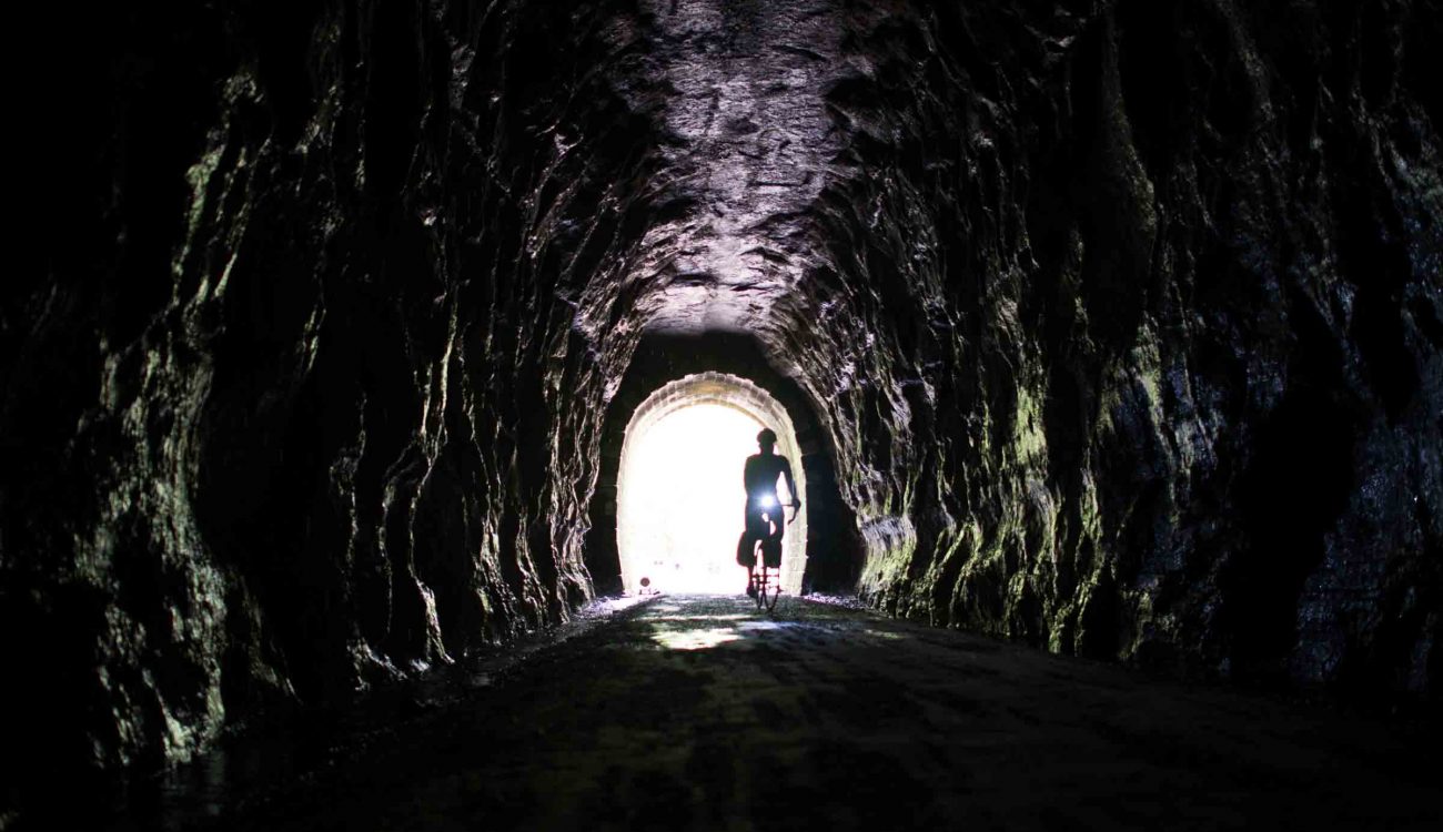 Riding through a tunnel on the Elroy-Sparta State Trail