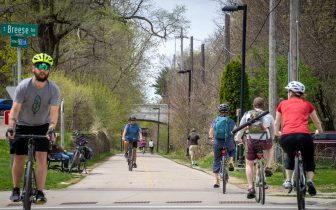People walk and ride bicycles on the Southwest Path in Madison, WI
