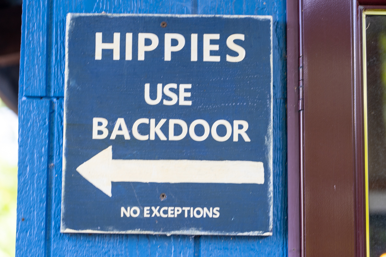 Hippies use backdoor sign