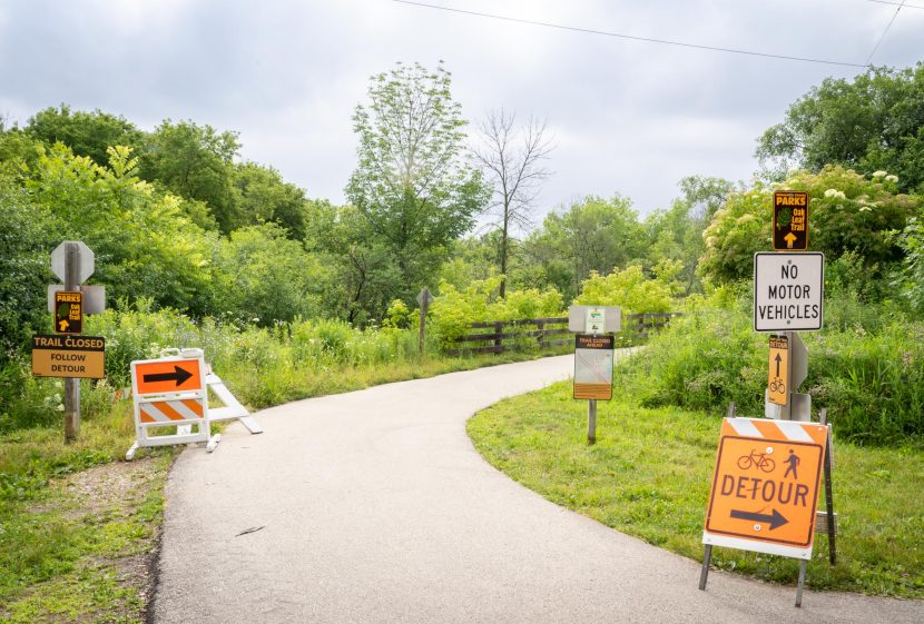 Trail closed and detour signs on Oak Leaf Trail