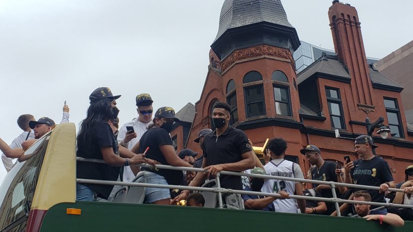 giannis on a bus during parade