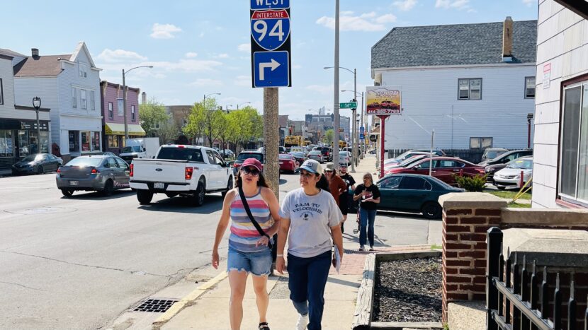 advocates walk along Milwaukee's National Ave